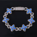 Iced Out Flower Clover Bracelet – Four-Petal Gemstone Hip Hop Bangle with Box Clasp | Esekeem White Gold + Blue - KRWN Fine Jewelry